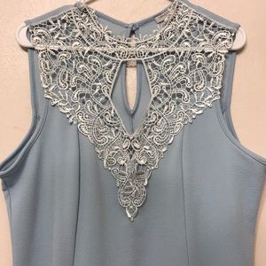 Blue shirt sleeve dress shirt.